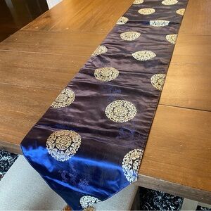 Chinese brocade satin table runner with a gold and blue "Fu" symbol and dragon